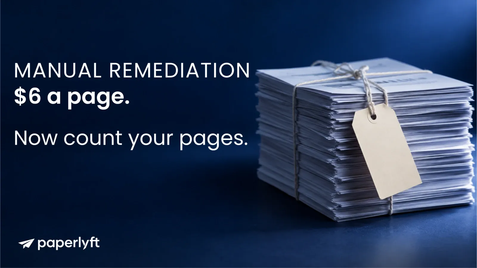 A tall stack of printed documents tied with string and a blank price tag.