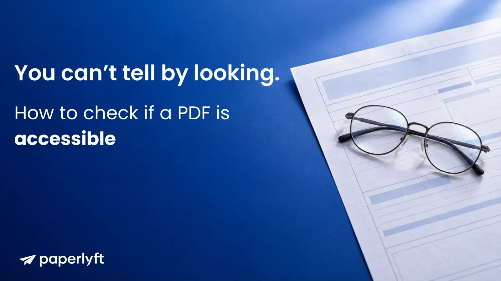 Reading glasses resting on printed form on a blue background, You can’t tell by looking. How to check if a PDF is accessible